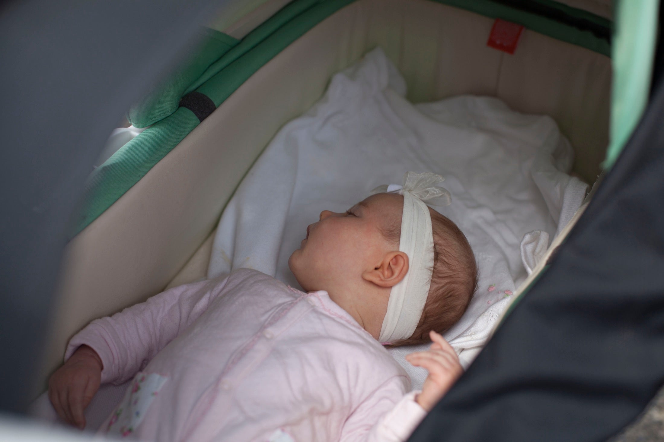 A baby resting with a familiar sleep cue